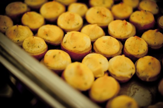 The food was another trick; we could not afford a plated or buffet meal. However, we picked eight different "heavy" appetizers and placed them at stations throughout the venue. this made people get up and see each other. We also put small plates at all of the stations so people took less. Many of our guests commented afterwards about how much they loved the "meal" even though they only had appetizers! The tricks was picking meal-like things (sliders, stuffed potatoes, etc) and having a caterer who was willing to work within our means. 